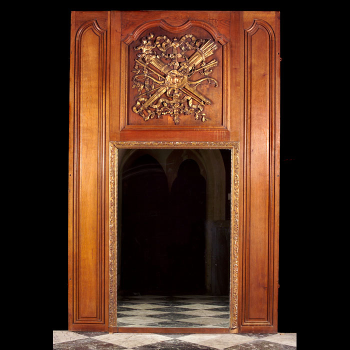 A Louis XVI oak overmantel mirror