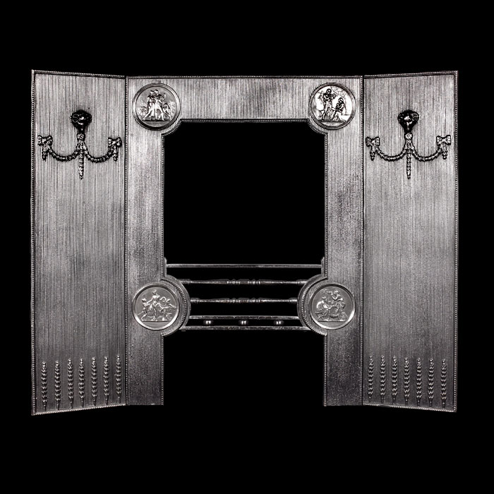 A Triple Panel Cast Iron Fireplace Insert