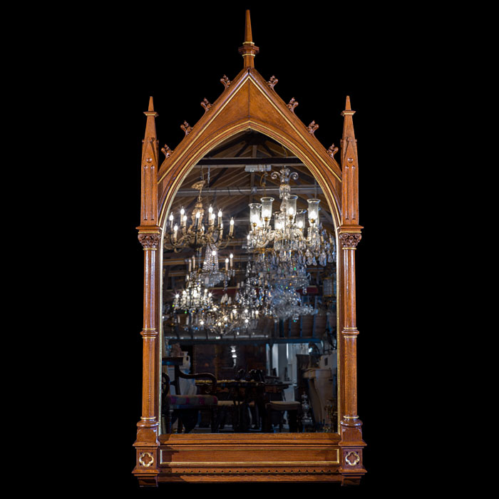 A Large Victorian Neo-Gothic Oak and Parcel Gilt Wall Mirror