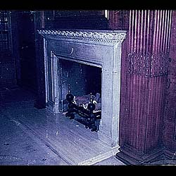 A late 19th century Queen Anne style Baroque stone chimneypiece 
