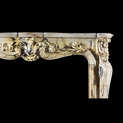  An antique French Rococo marble fireplace surround   