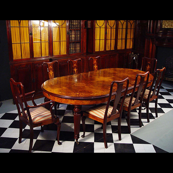 A 20th century Queen Anne style walnut and mahogany dining table    