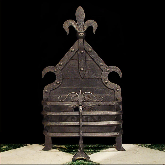 An Arts & Crafts Cast Iron Fire Grate 