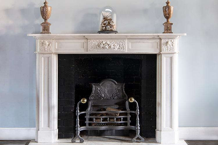 In this post, we'll show you how to decorate an unused fireplace