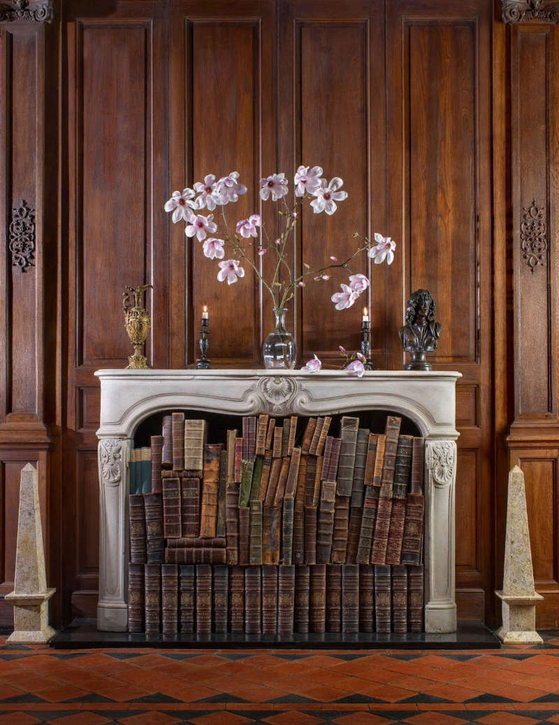 In this post, we'll show you how to decorate an unused fireplace